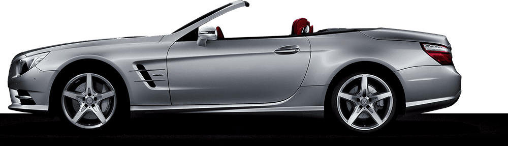 High-resolution image of a sleek silver convertible luxury car with red interior.